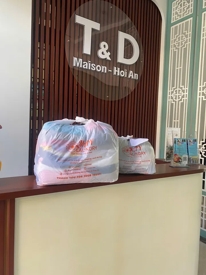 Clean laundry packed and labelled by May Laundry in Hoi An